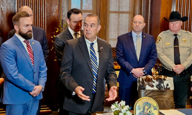 Gov. Mike Kehoe speaks Wednesday before signing a bill that puts the St. Louis Metropolitan Police Department under control of a state board