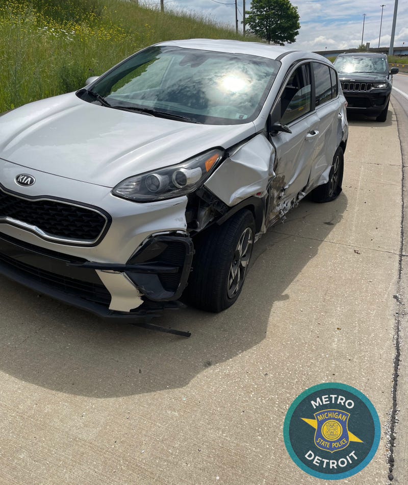 Kia SUV damaged after being hit by ambulance in Detroit