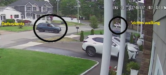 Defendants allegedly in blue Isuzu near the victim walking.