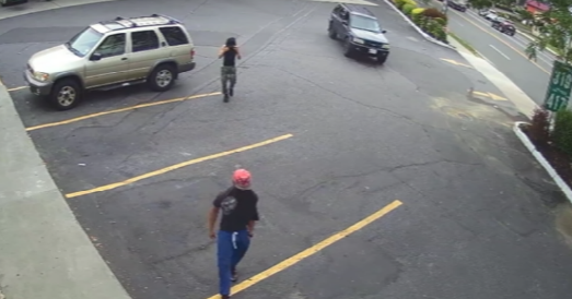All three defendants allegedly heading towards the victim, with Hernandez in the blue Isuzu.
