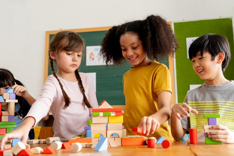 Kids play in a school classroom