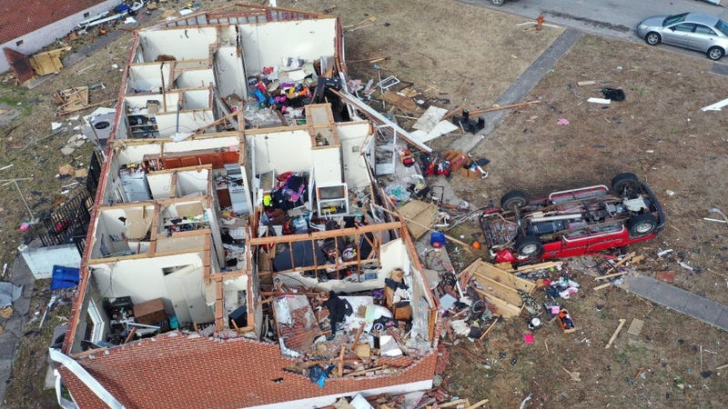 In an aerial view, residents continue to recover from Friday's tornado on December 14, 2021 in Dawson Springs, Kentucky. Multiple tornadoes touched down in several Midwest states late Friday December 10, causing widespread destruction and leaving scores of people dead and injured.