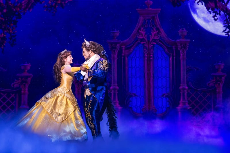 Kyra Belle Johnson and Fergie L. Phillippe who play those title characters in "Beauty and the Beast" at Minneapolis' Orpheum Theatre. Yellow dress included.