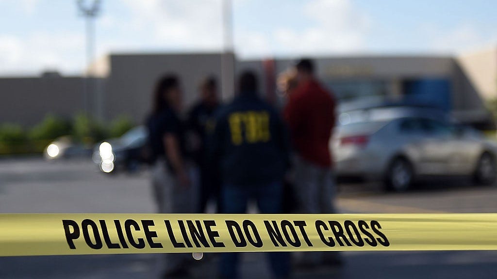 Police say 'somebody moved' woman's body that was found inside plastic container in pickup truck