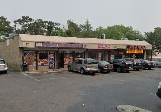 A man's body was found Wednesday behind a Pita & Pizza location in Brentwood.