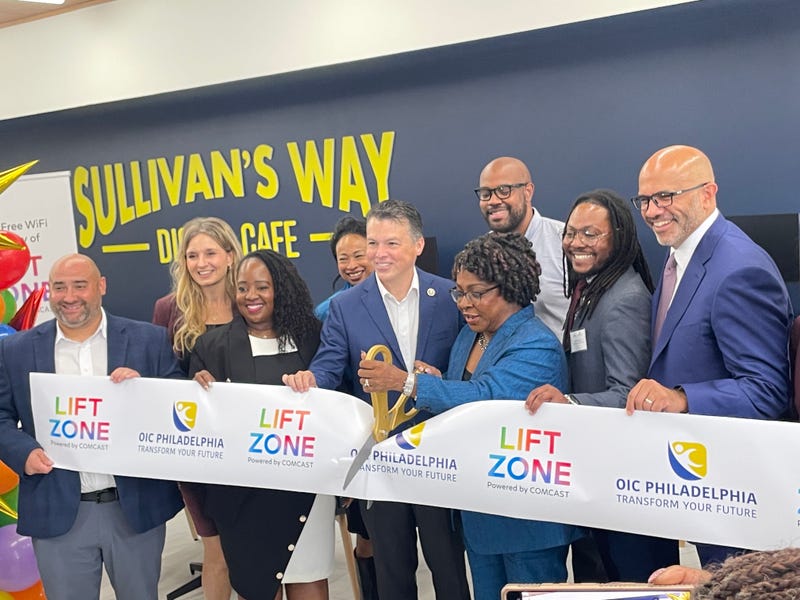 OIC Philadelphia President and CEO Sheila Ireland cuts the ribbon on the new Comcast Lift zone at the school.