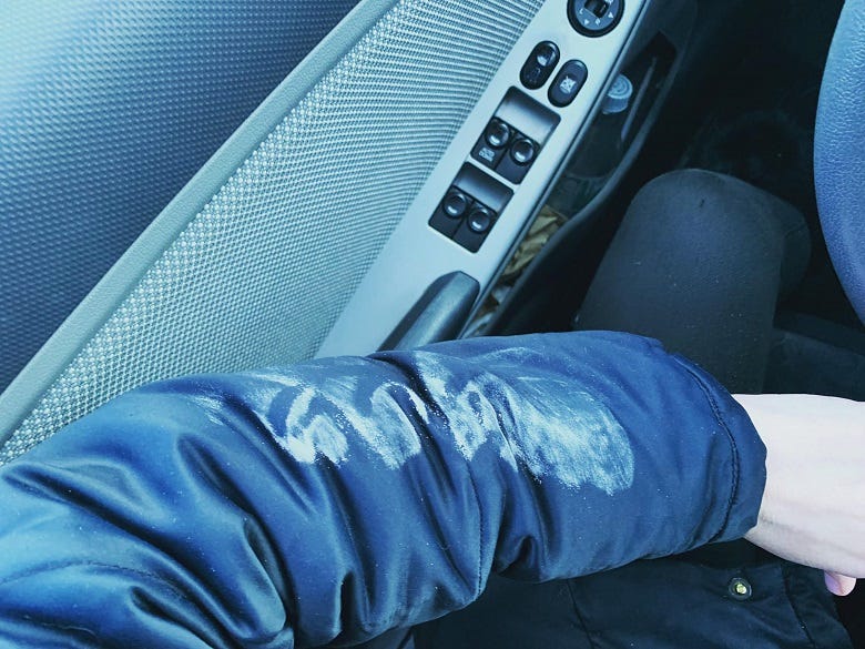Lissa's coat covered in Winter road grime