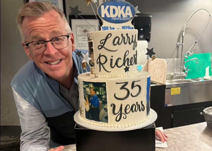Larry Richert with 35 years cake from Oakmont Bakery