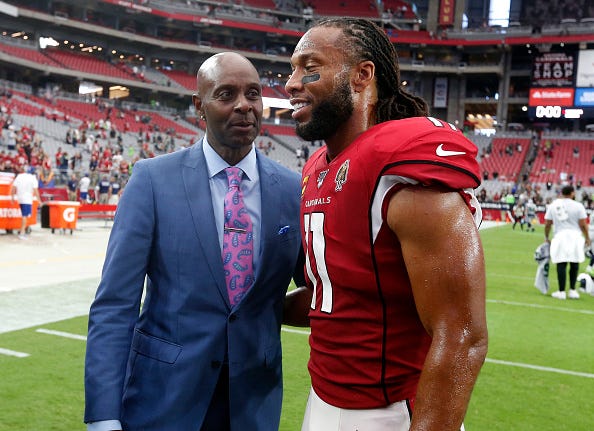 Jerry Rice, left, and Larry Fitzgerald
