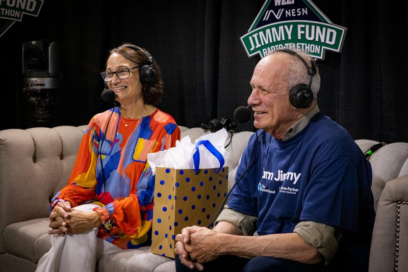 Lisa Scherber and Larry Lucchino with a special gift for Ordway