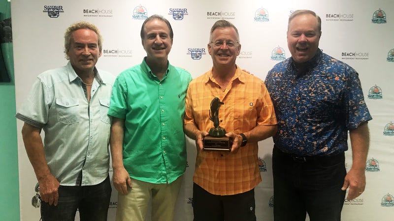 Larry was presented with the with the first-ever Media Ambassador of the Year Award by the Bradenton Area Convention & Visitors Bureau To the right of Larry Richert is Eric Caryns, the owner of Cedar Cove Resort on Anna Maria and to Larry’s left is the Mayor of Bradenton, Gene Brown.
