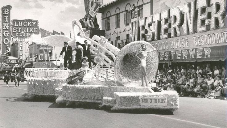 Image of floats going down Fremont Street during an old Helldorado Days Parade in Las Vegas