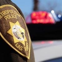 A Las Vegas Metro Police Officer responds to a crime scene