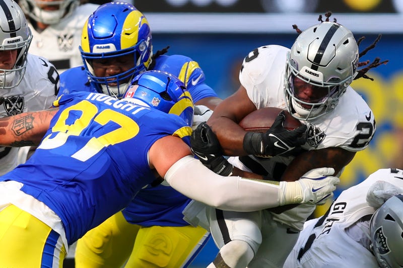 Alexander Mattison #22 of the Las Vegas Raiders runs the ball against the Los Angeles Rams during the third quarter at SoFi Stadium on October 20, 2024 in Inglewood, California.
