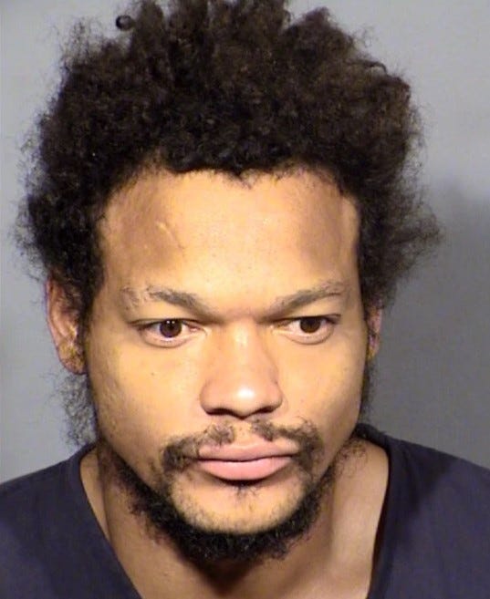 Booking photo of murder suspect Lee Johnson