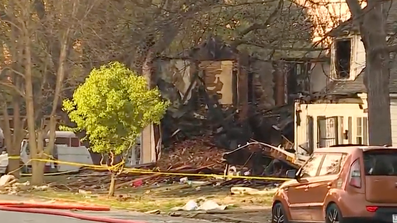 The aftermath of a house explosion in Lexington, MO