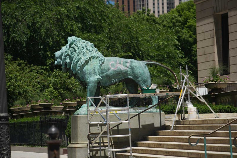 Someone tagged one of the Art Institute of Chicago lions with spray paint.