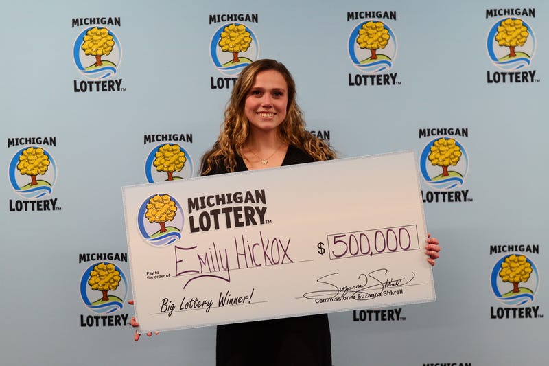 Emily Hickox with Michigan Lottery check