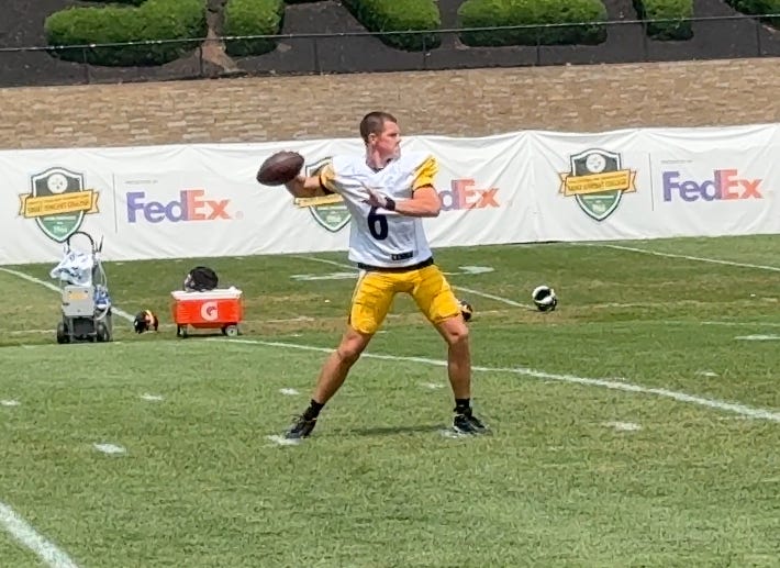 Logan Woodside throwing in practice