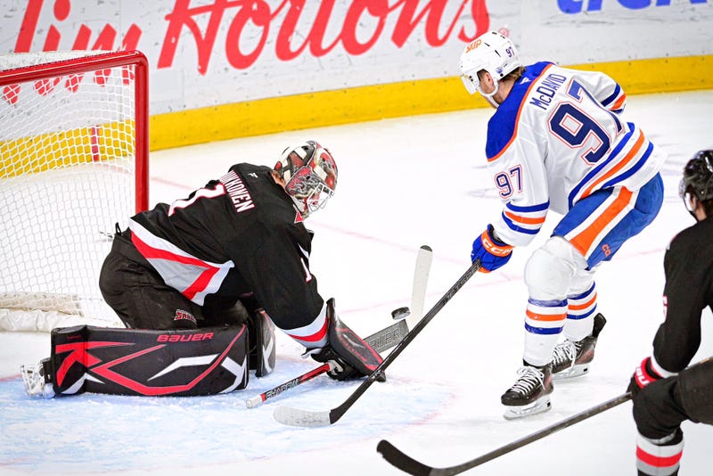 Ukko-Pekka Luukkonen and Connor McDavid