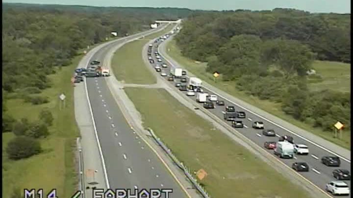 Driver found shot to death on M-14 near Ann Arbor during rush hour; Police searching for suspect who fled scene