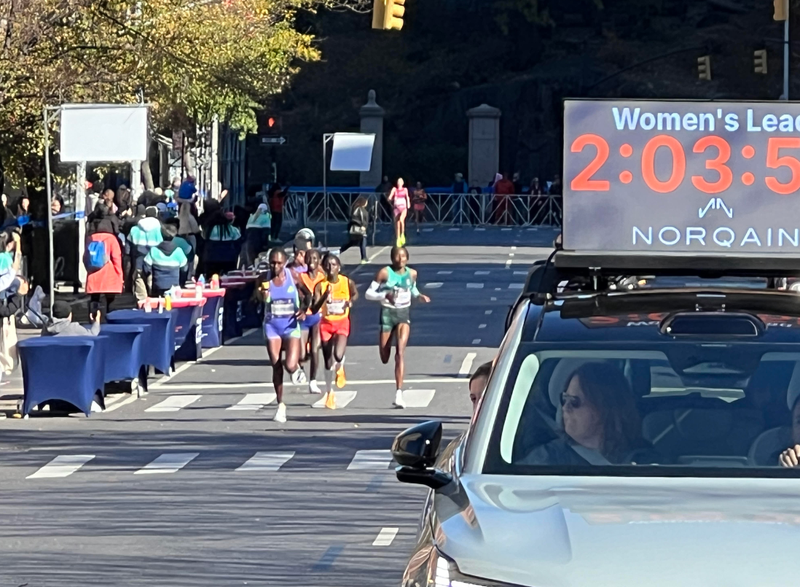 Runners making their way down Fifth Avenue in Harlem on Nov. 3, 2024, for the TCS New York City Marathon.