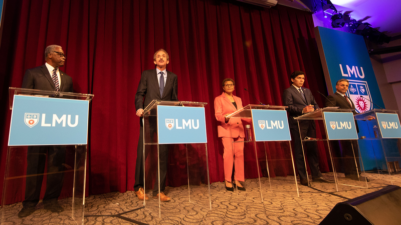 Los Angeles mayoral candidates participating in a debate on Feb. 22, 2022 at Loyola Marymount University. From left: Mel Wilson, L.A. City Attorney Mike Feuer, Rep. Karen Bass and L.A. City Council Members Kevin de León and Joe Buscaino.