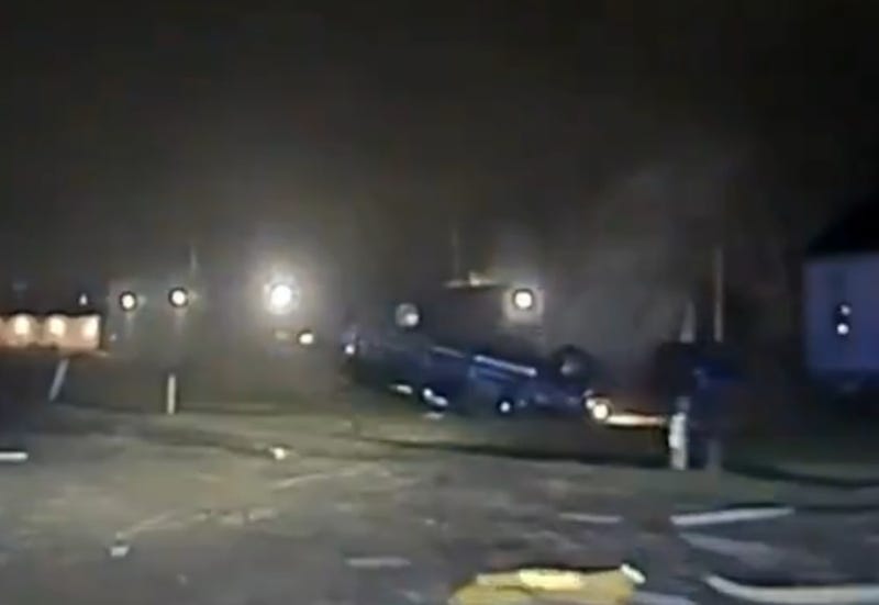 Dash cam footage shows rolled-over SUV in Harrison Twp.