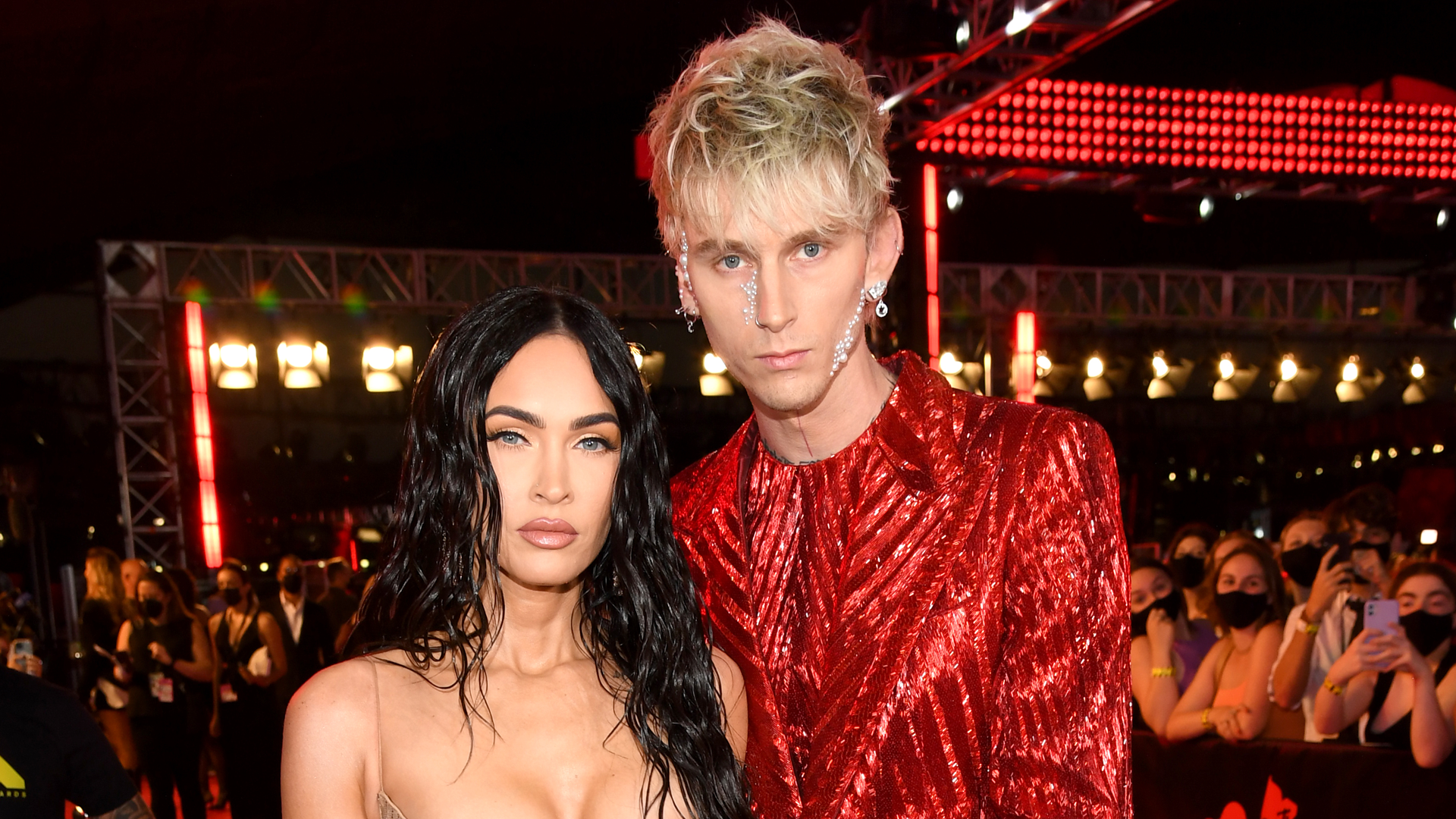 Megan Fox and MGK give each other matching tattoos, then pose nearly naked and talk about it