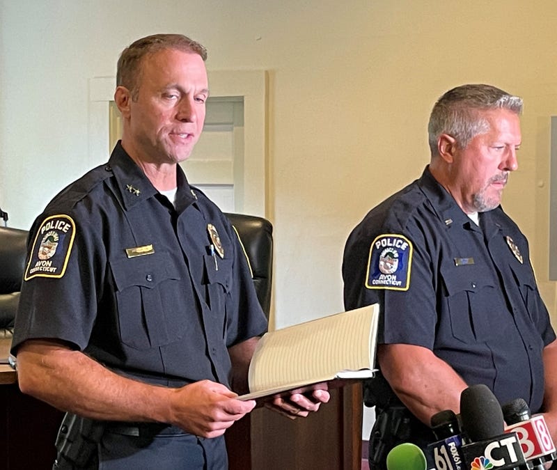 Avon Police Chief Paul Melanson (L)