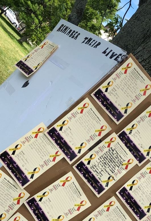 A memorial to COVID-19 victims, posted outside the CT Capitol by SEIU 1199 New England, 6/18/20.