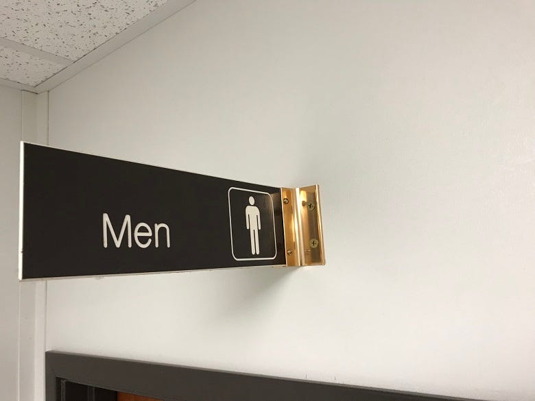 Men's Room sign
