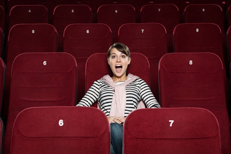 Woman in movie theater
