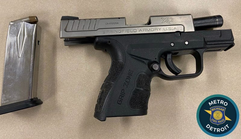 Photo of a 9mm Springfield automatic that state police recovered from a suspect during a traffic stop.