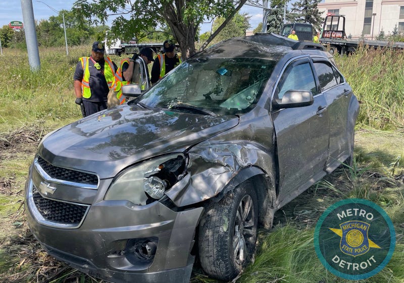 Chevy damaged after slamming into tree on I-94 exit to Merriman Road.