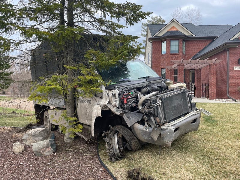 Stolen tree trimming truck crashes into tree