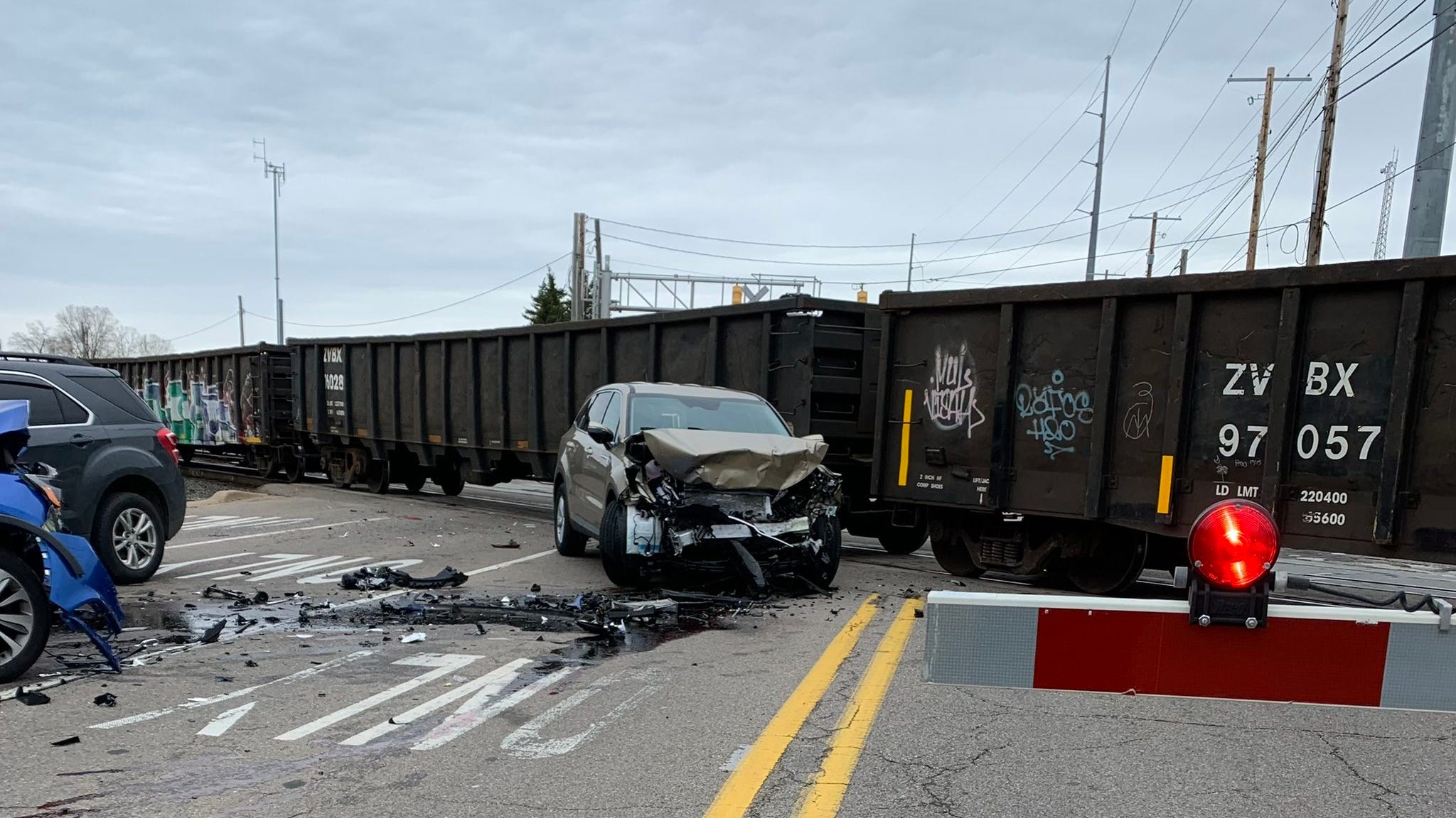 MSP: vehicle gets pushed onto railroad tracks in car crash, then smashed by train that couldn't stop in time