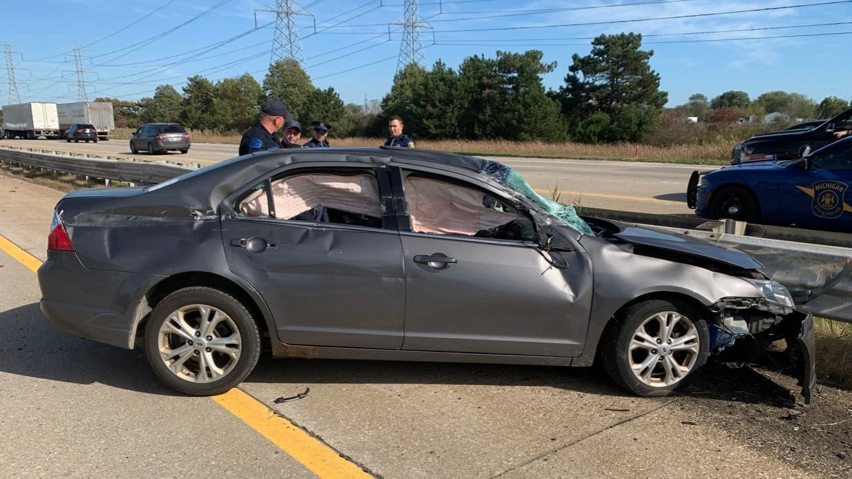 Farmington resident arrested after chase, crash in stolen car on I-75: MSP