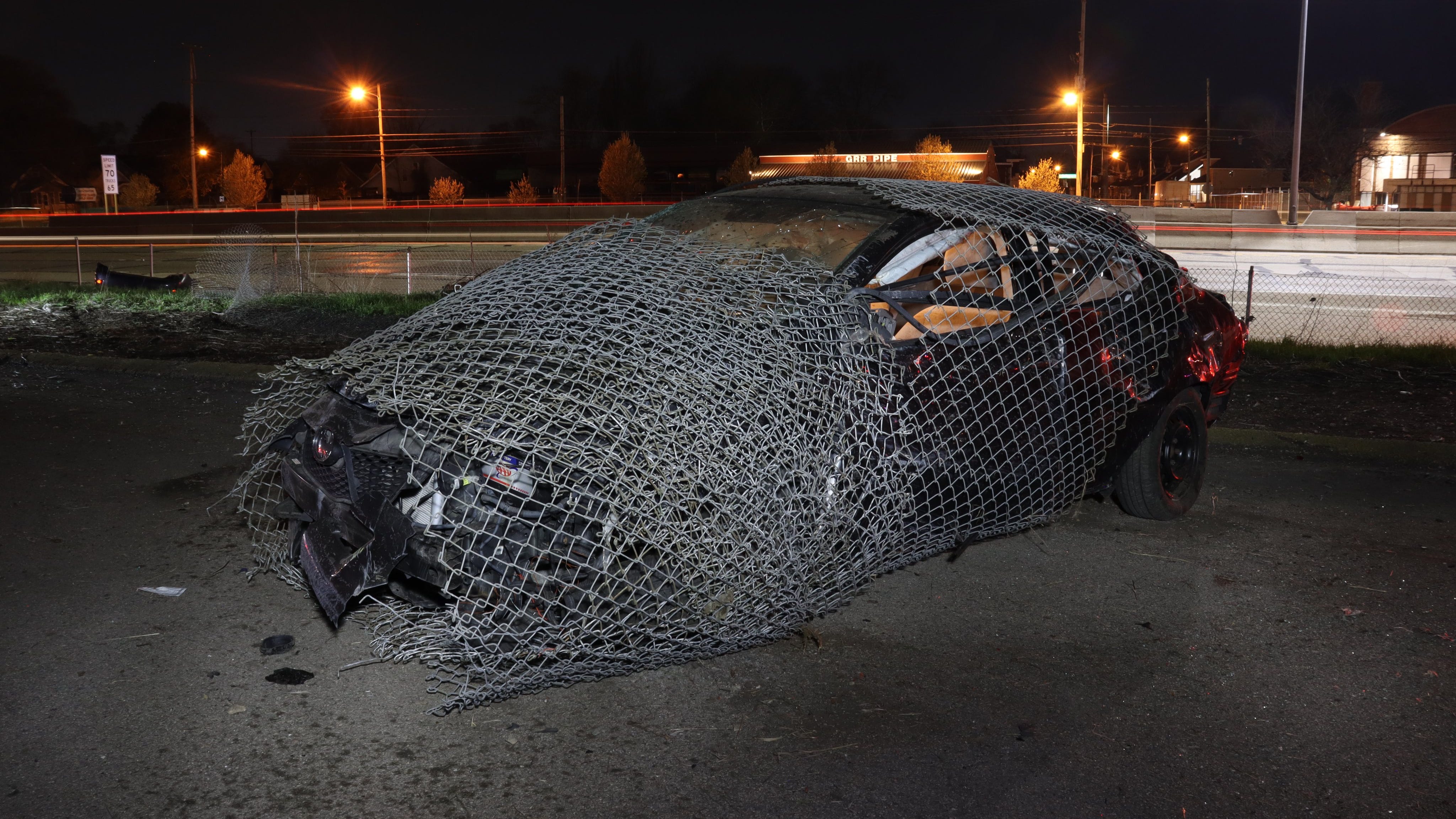Driver killed as car goes off highway, gets wrapped in fence in West Michigan rollover crash