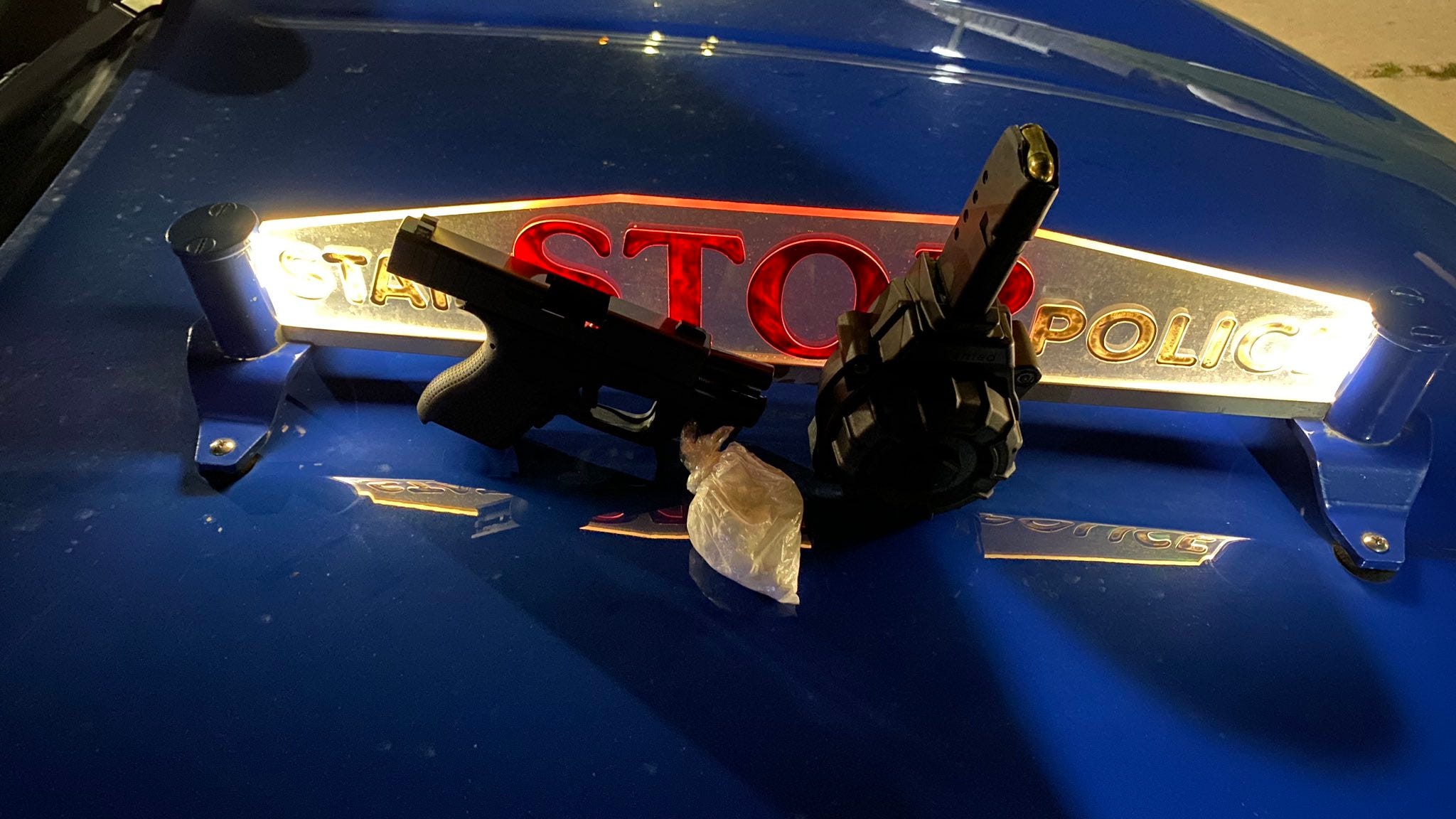 Detroit man arrested with bag of pills hidden in groin, stolen gun in car after he was caught going 85 on the Lodge