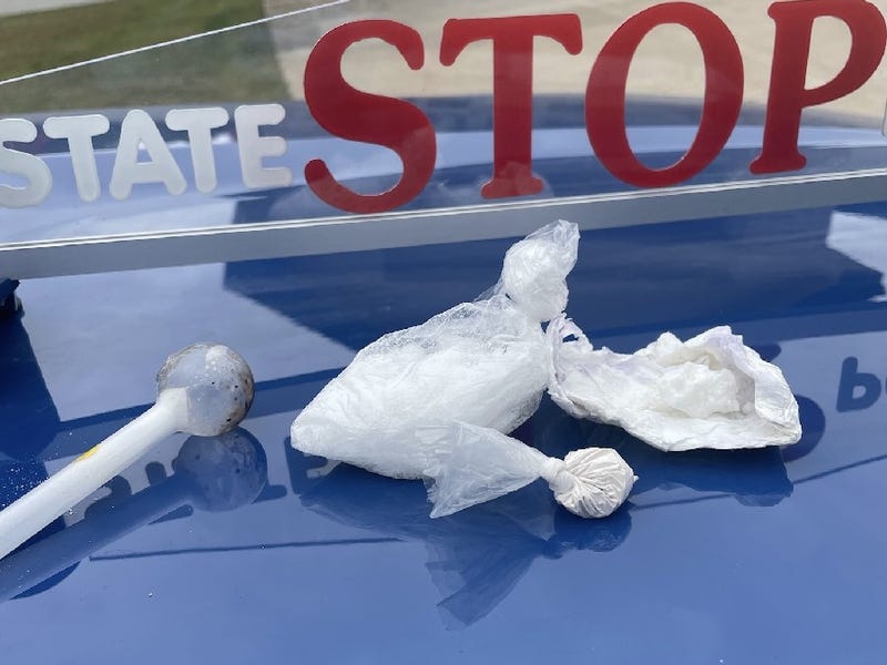 Bags of meth on Michigan State Police car after driver leads police dealer