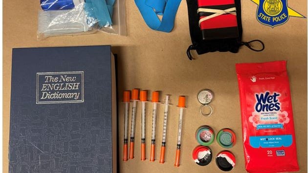 Michigan man arrested after troopers find meth in hollowed out dictionary during traffic stop for harassing ex-girlfriend