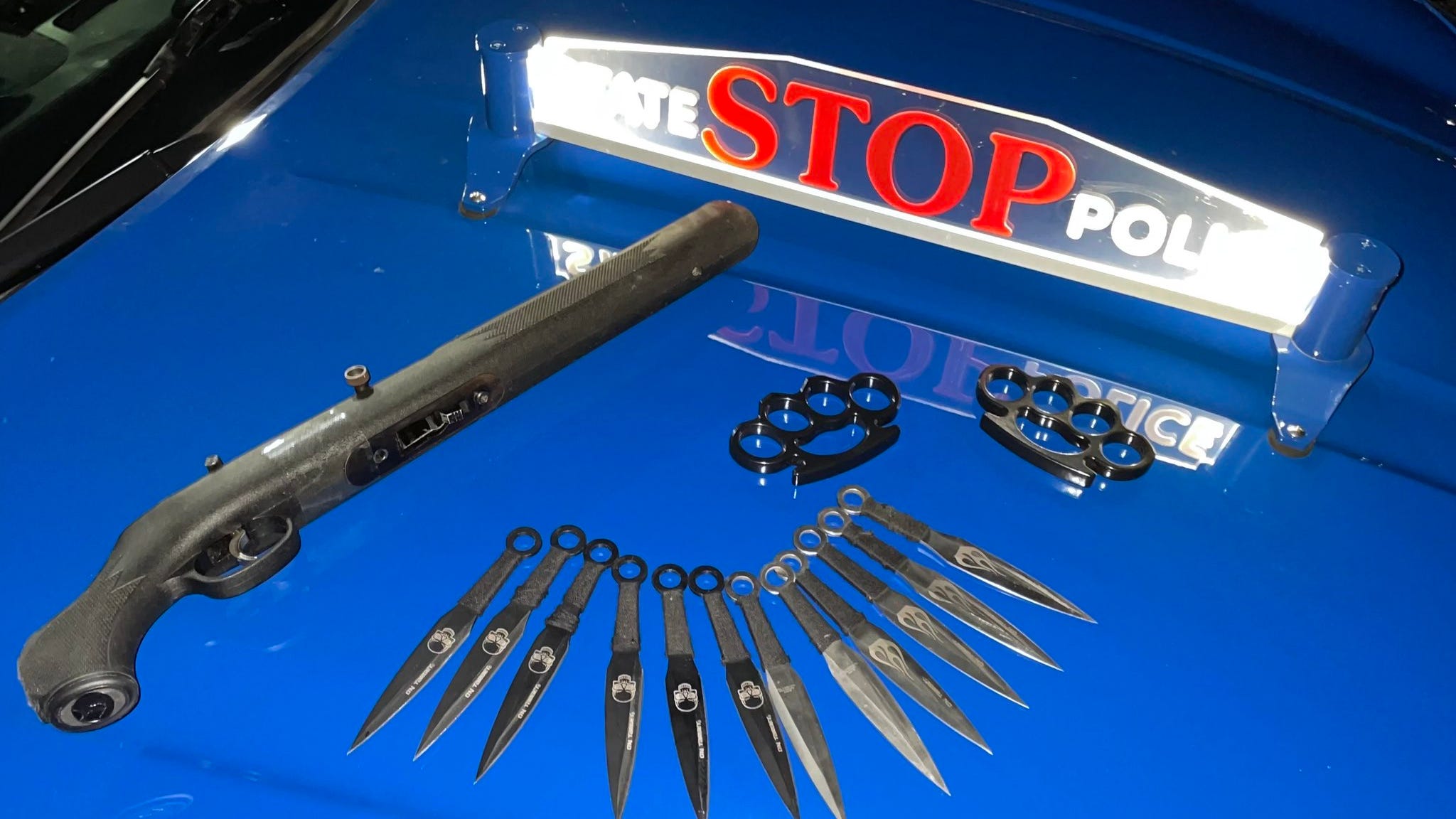 2 arrested as Michigan State Police find gun, brass knuckles and 12 double-edged daggers during traffic stop in Macomb County