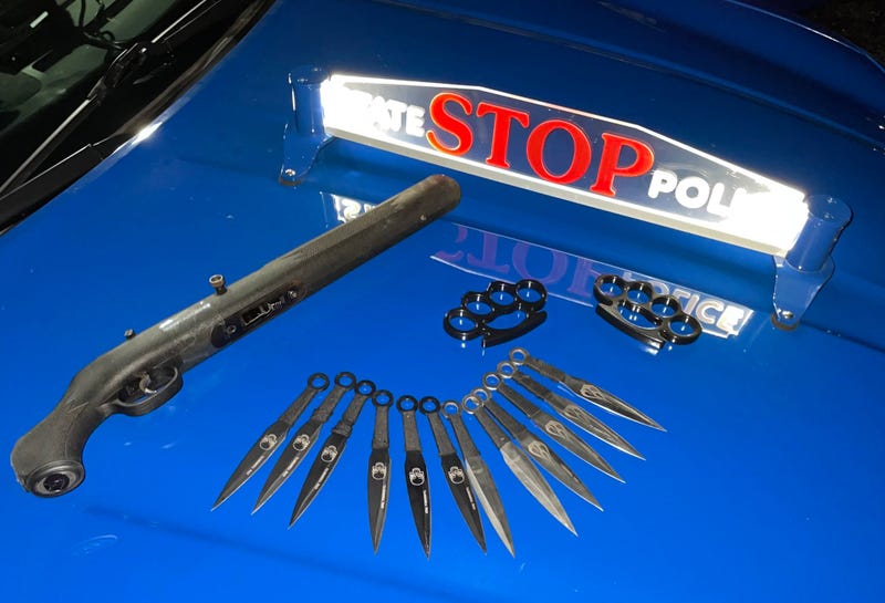 Short-barreled rifle, brass knuckles and knives on MSP car
