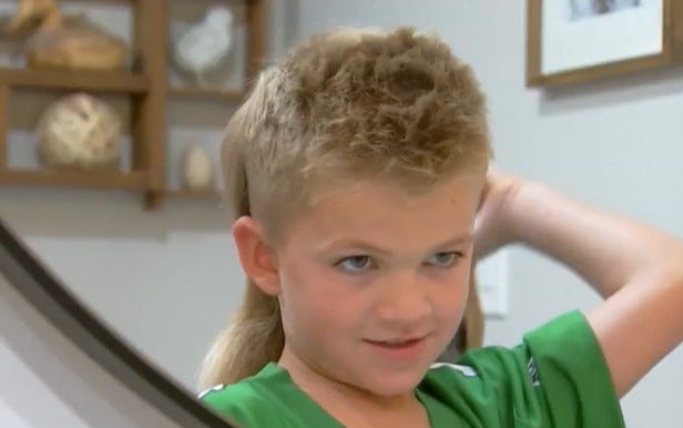 Rory Ehrlich, 6, styles his prize-winning mullet.