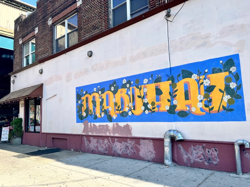 A mural reading "Mabuhay" Amazing Grace