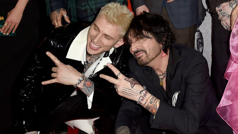 SCREENSHOTS: Watch Machine Gun Kelly Transform into Motley Crue Drummer Tommy Lee for 'The Dirt'