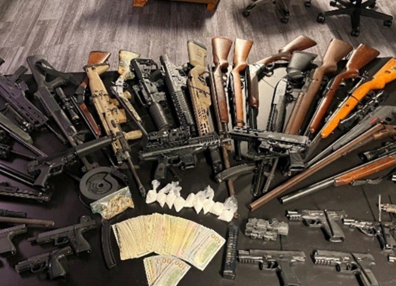 Guns and drugs seized in Macomb County raids