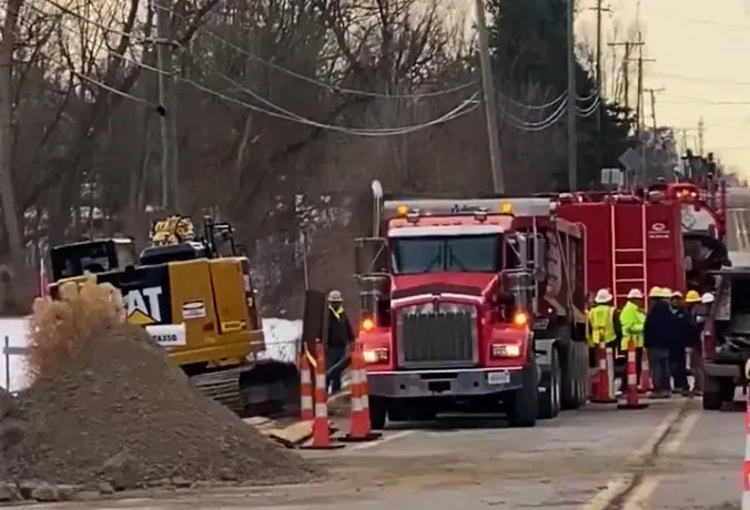 Crews work to repair broken sewer main in Washington Twp.