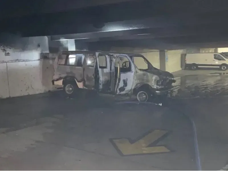 Macomb County work van torched inside parking garage